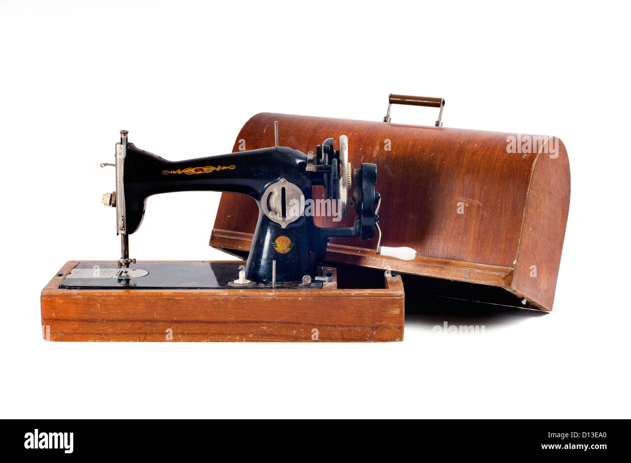 Vintage Singer sewing machine threaded with spool of white thread on white  Stock Photo - Alamy