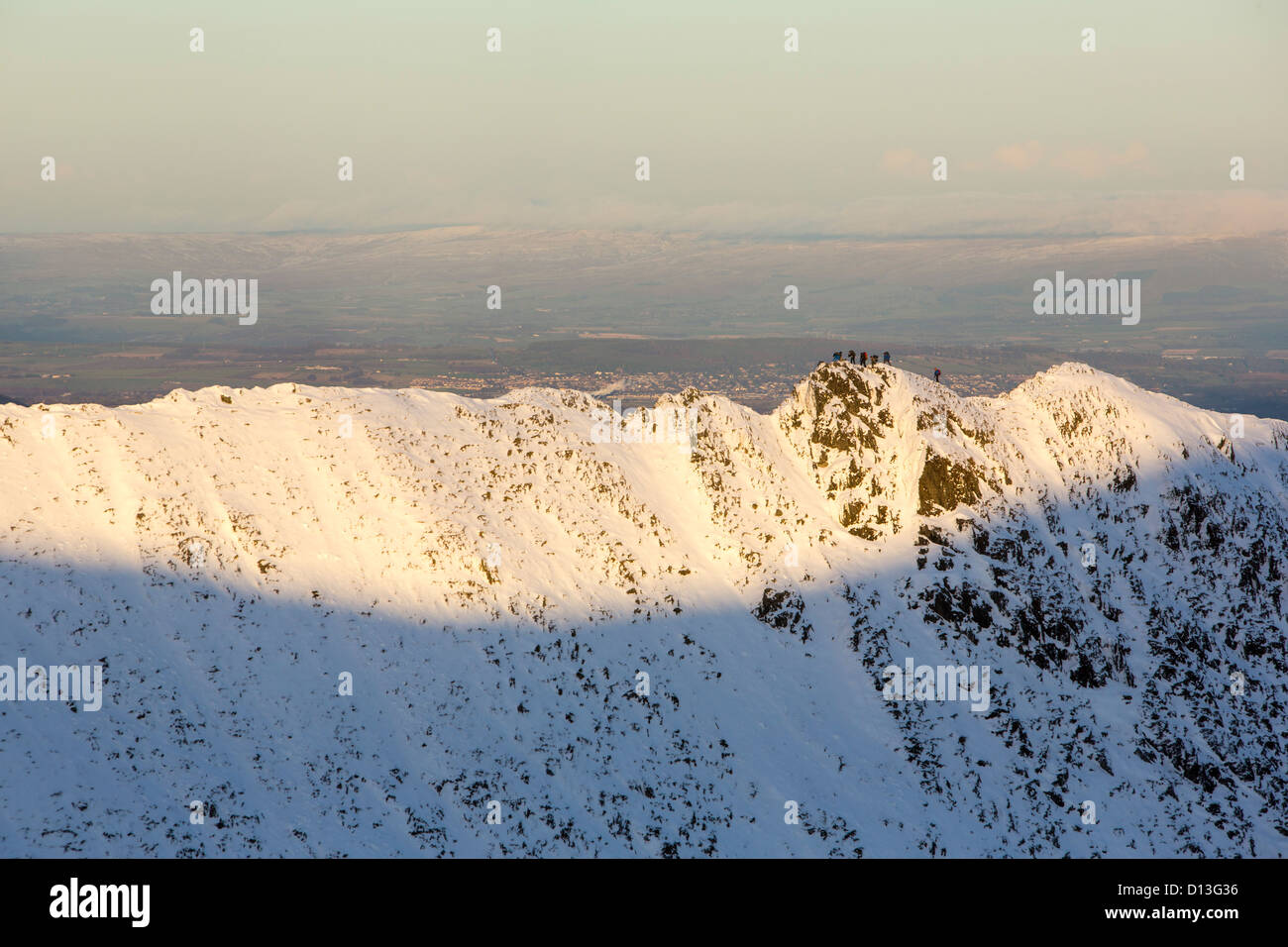 Striding edge winter walker snow hi-res stock photography and images ...