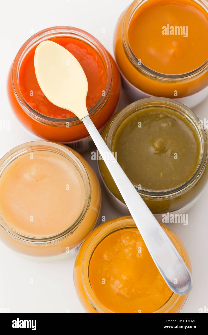 Studio shot of jars with baby food Stock Photo