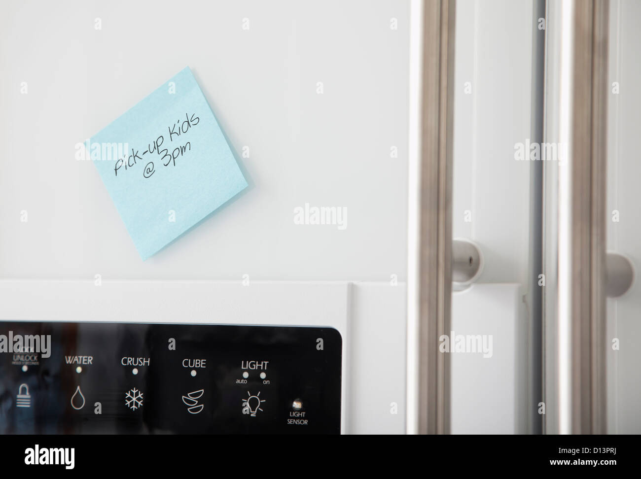 USA, Illinois, Metamora, Reminder card attached to fridge door Stock Photo