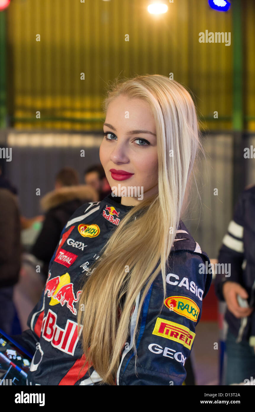 Bologna, Italy. 6th December 2012. Beautiful hostess at the motor show
