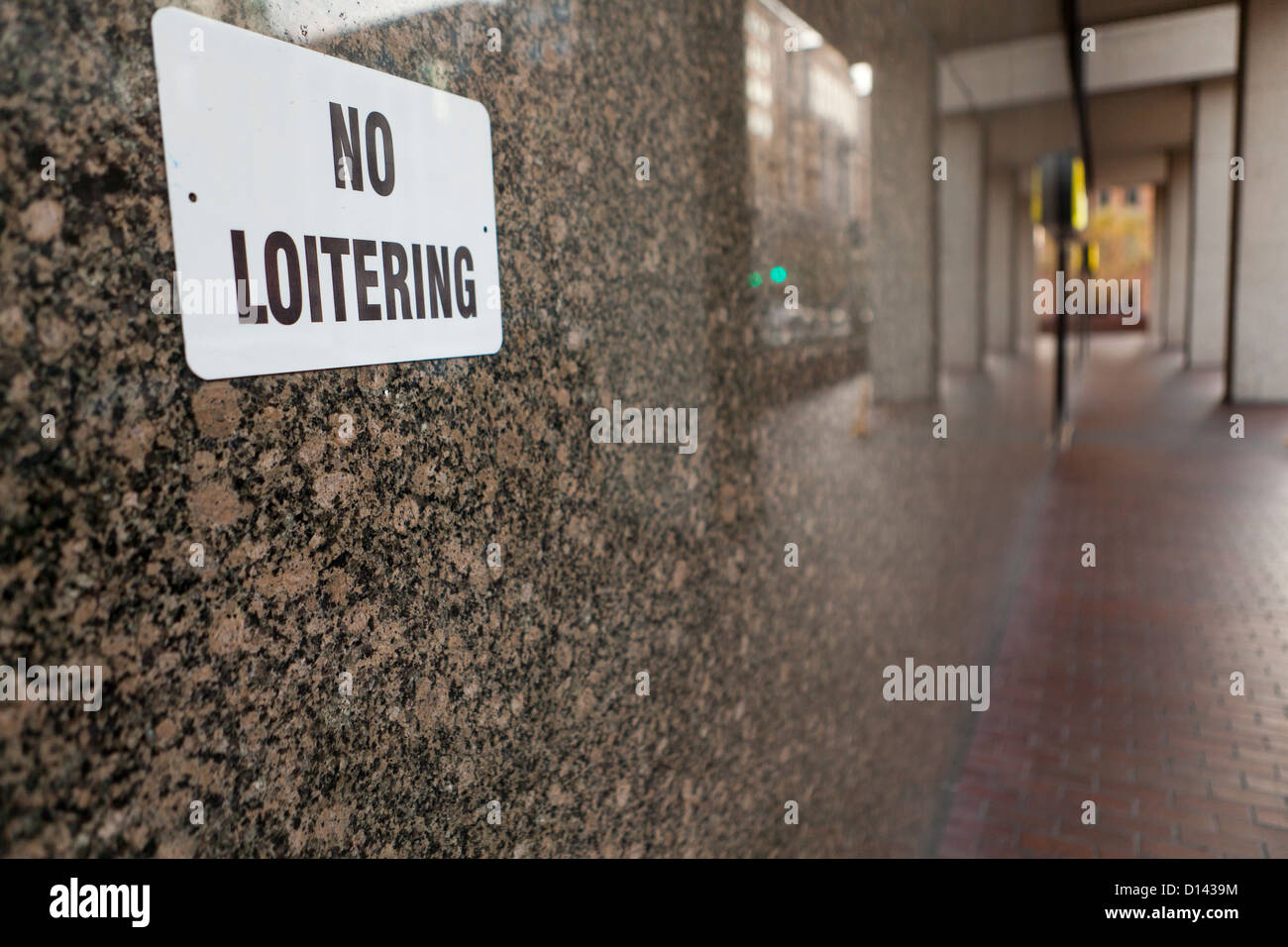 No loitering sign on side of building Stock Photo