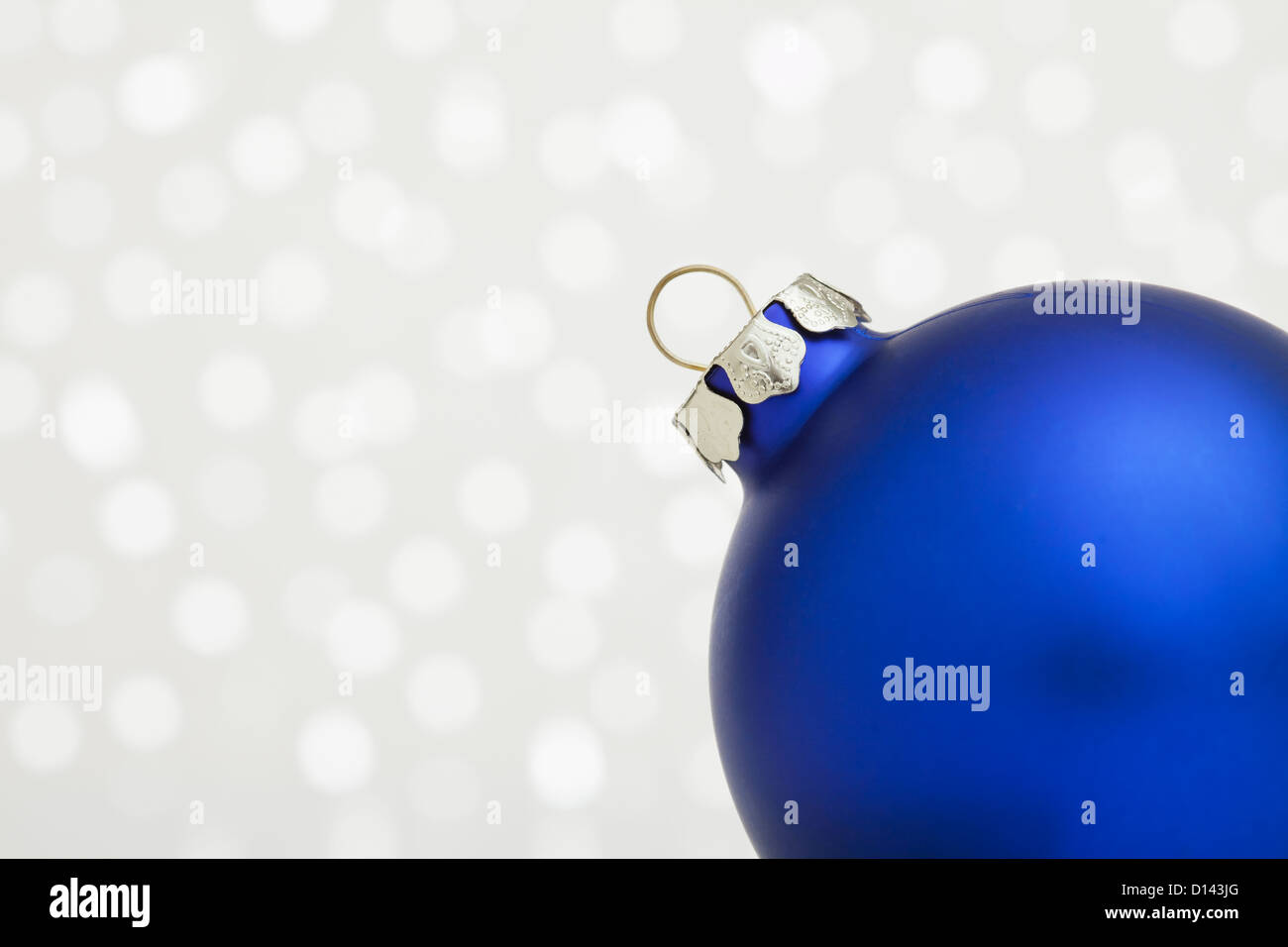 Part of Christmas bulb on sparkled background Stock Photo