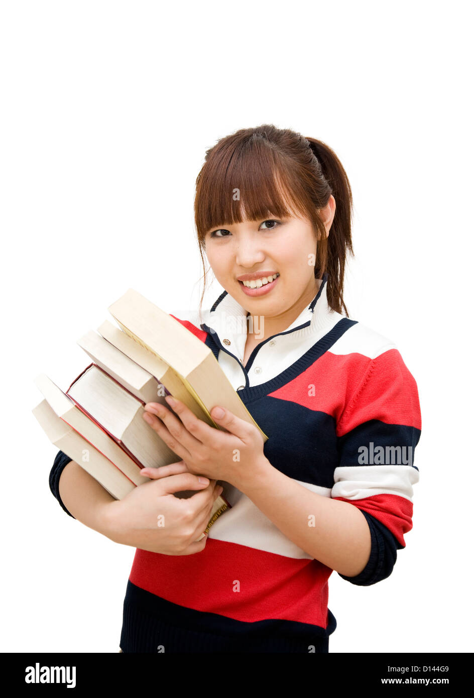 college student girl holding a stack of books Stock Photo