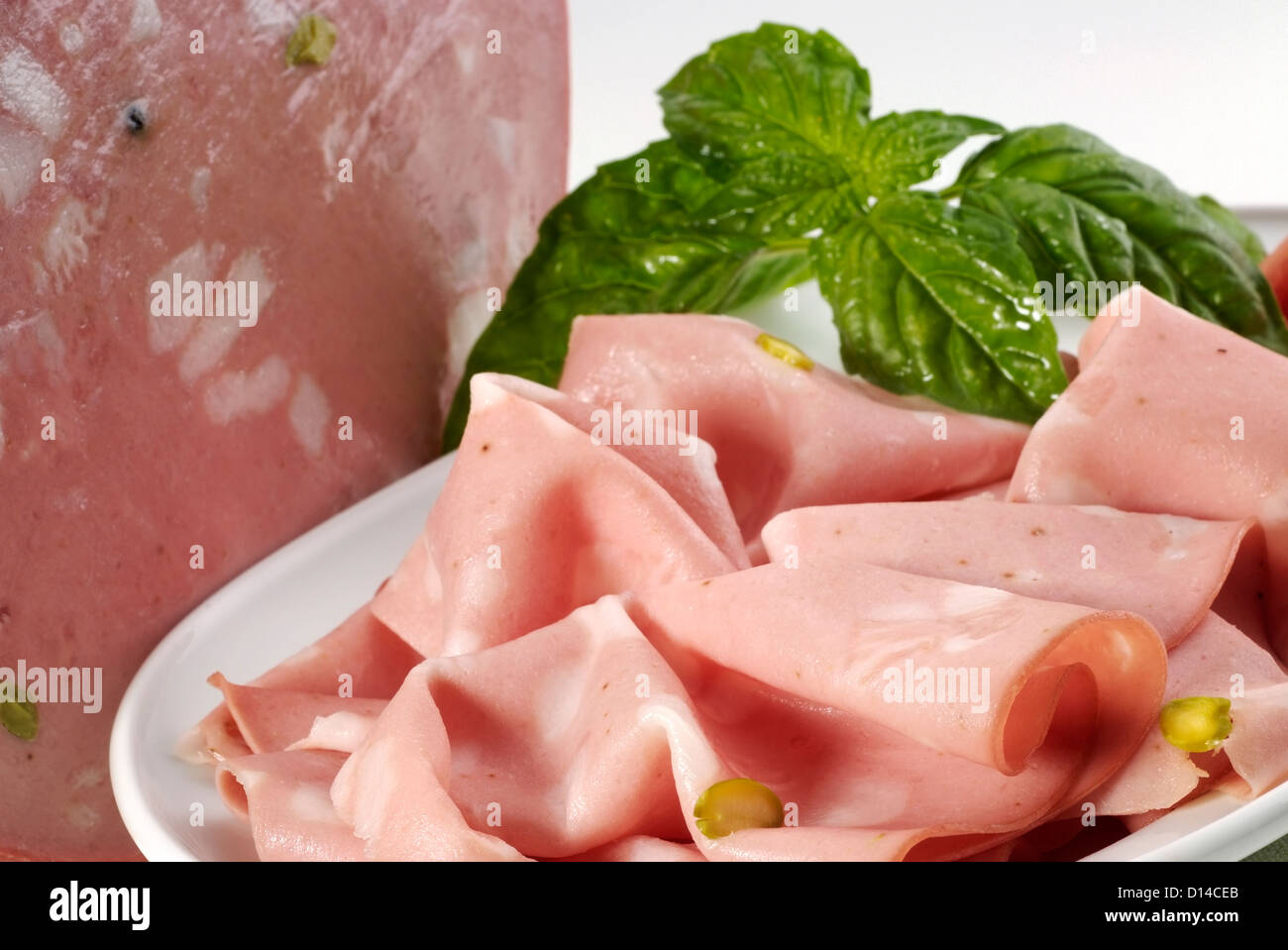 Mortadella and slices Stock Photo Alamy