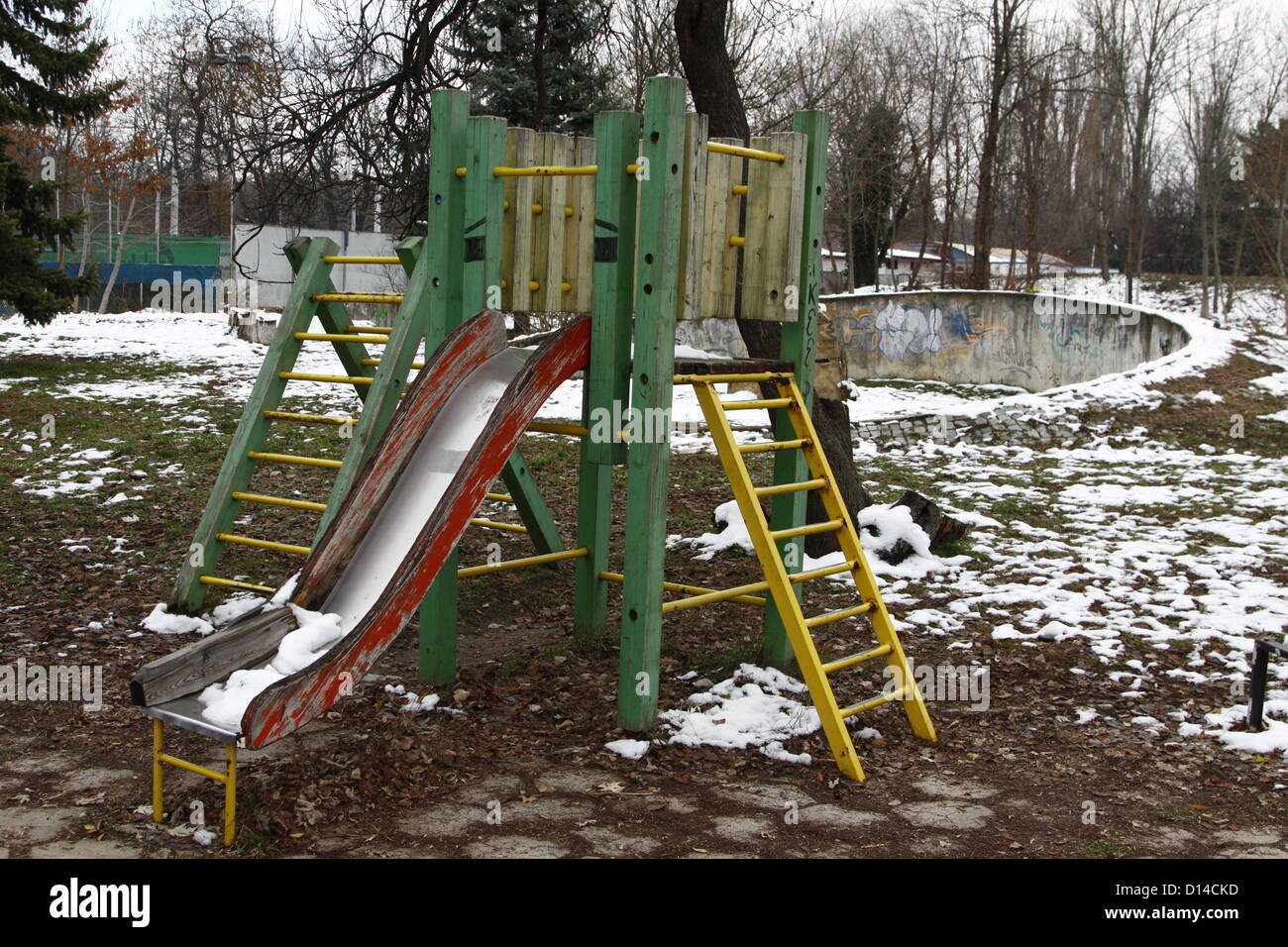Sofia, Bulgaria. 6th December 2012. Children's slide in a park in Sofia. Playgrounds are plenty in the Bulgarian capital, but maintenance is either scarce or entirely absent, making it dangerous for the children to use some of the installations. Credit:  Johann Brandstatter / Alamy Live News Stock Photo