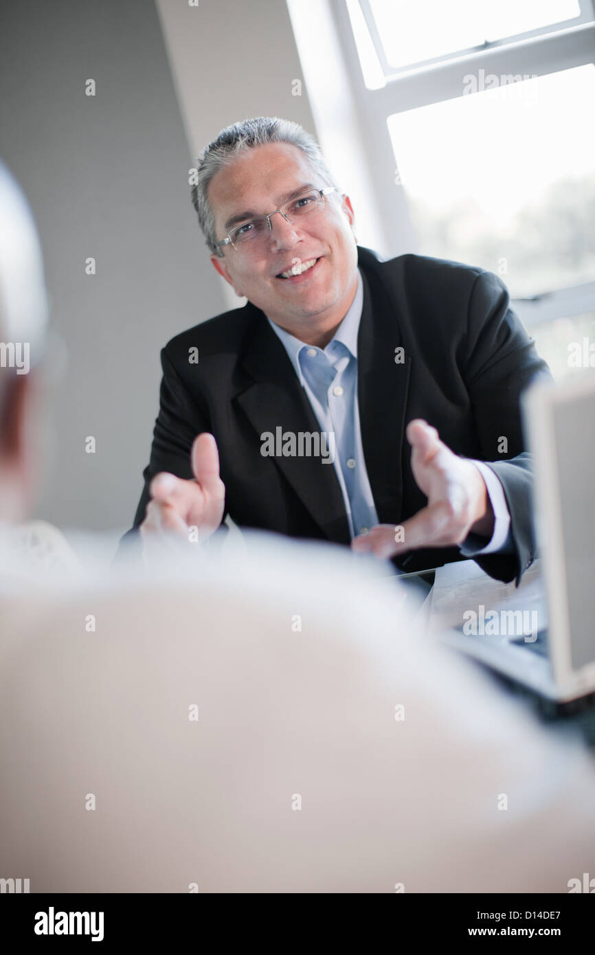 Businessman talking in meeting Stock Photo