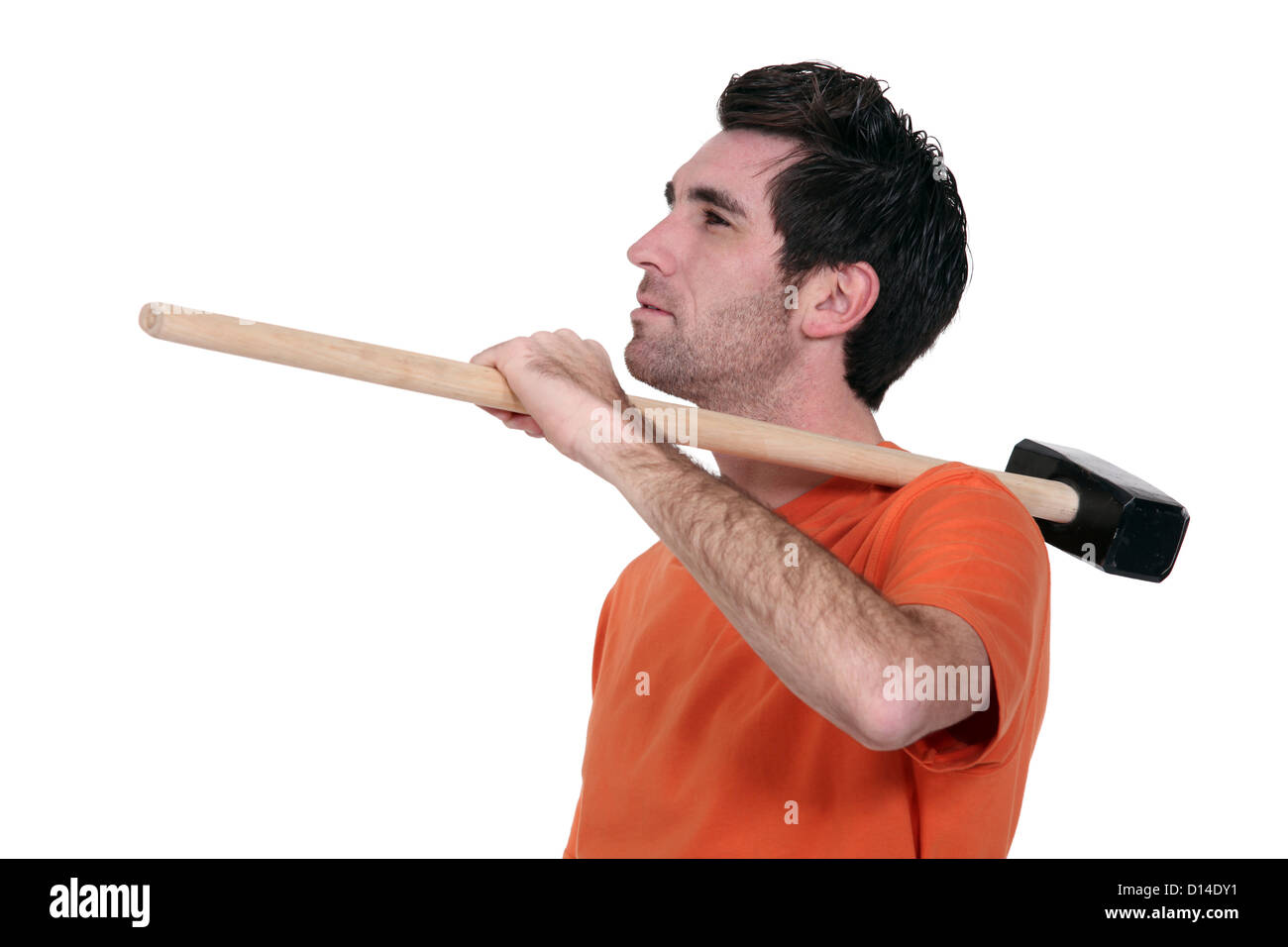 Casual man with a sledgehammer Stock Photo Alamy