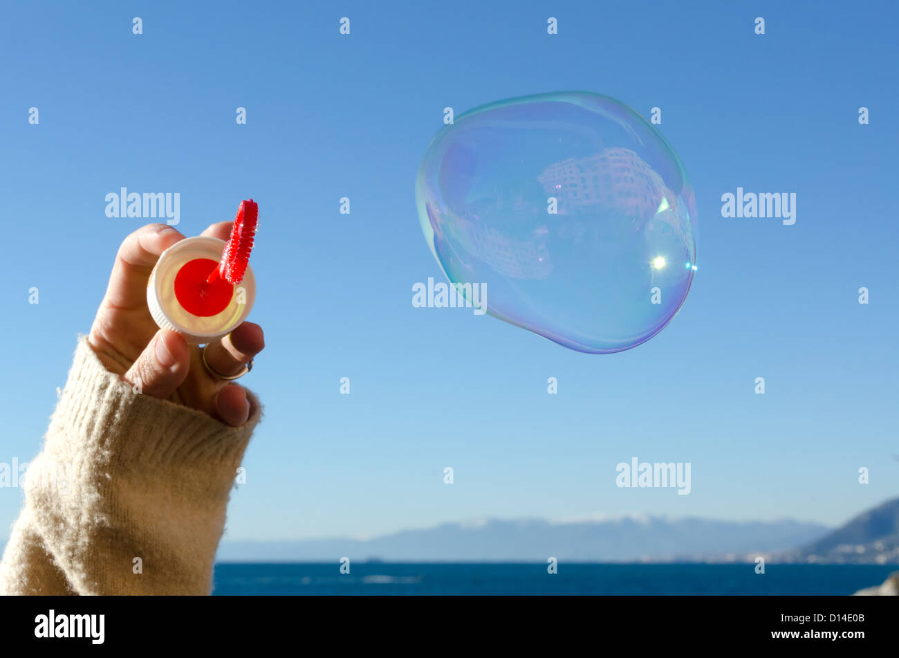 soap bubbles with reflection of the village of Camogli Stock Photo - Alamy