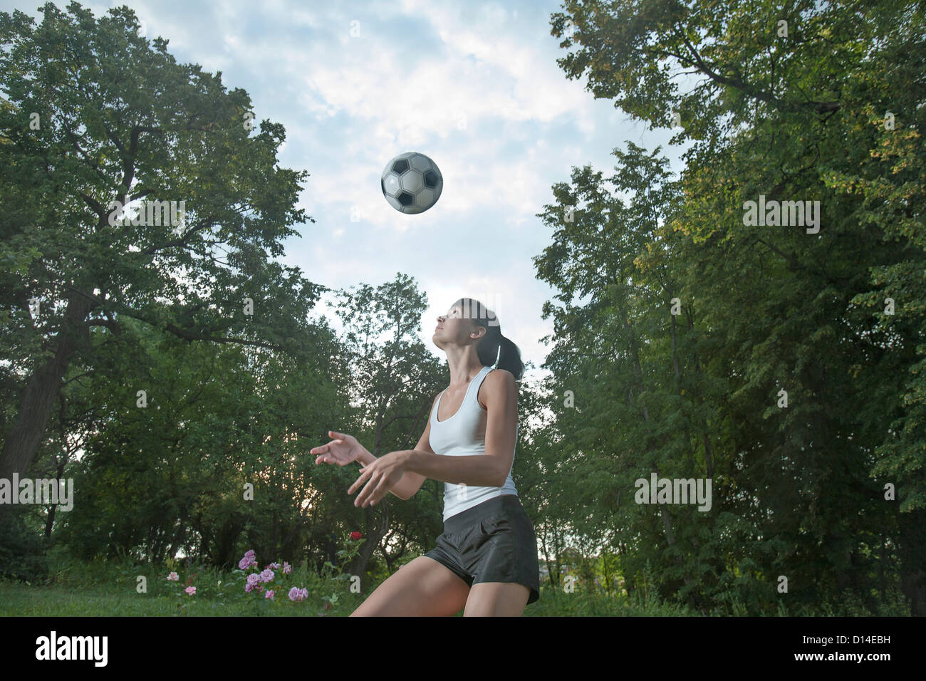 young woman practising football Stock Photo