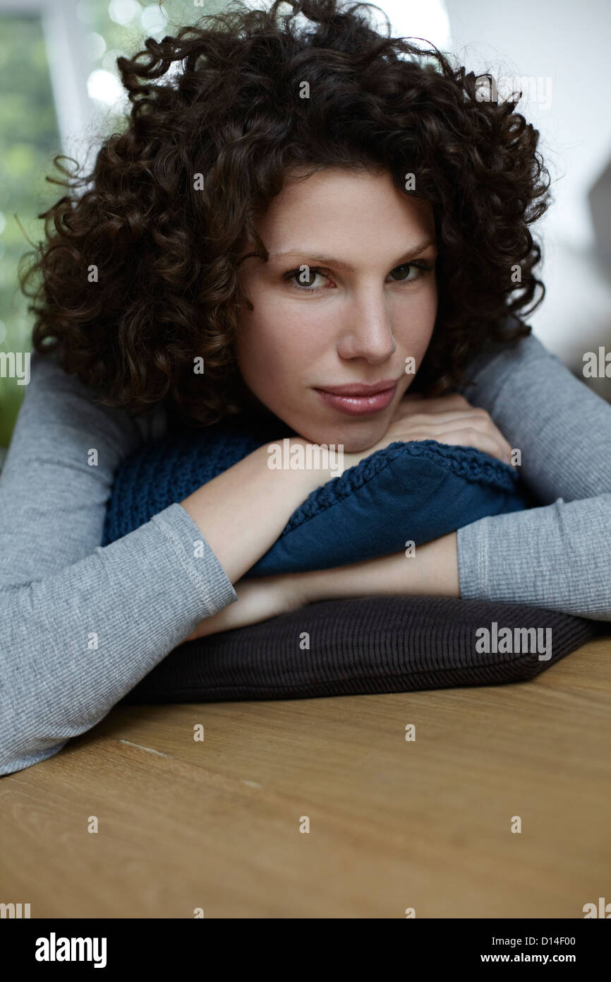 portrait of young woman at home Stock Photo
