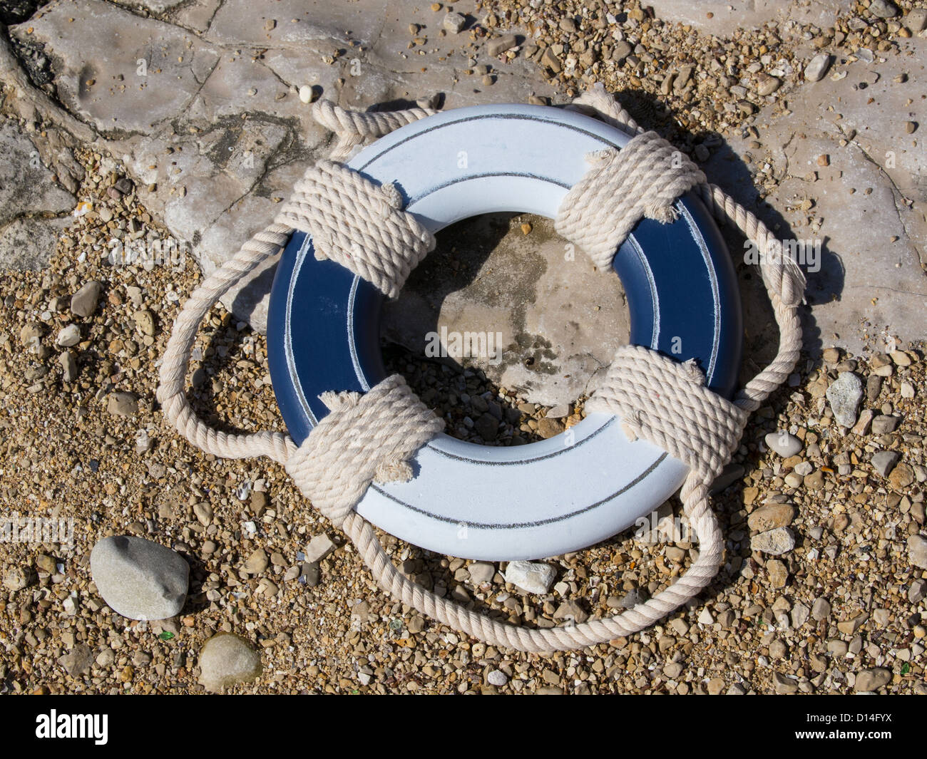blue and white safe belt on the beach Stock Photo Alamy