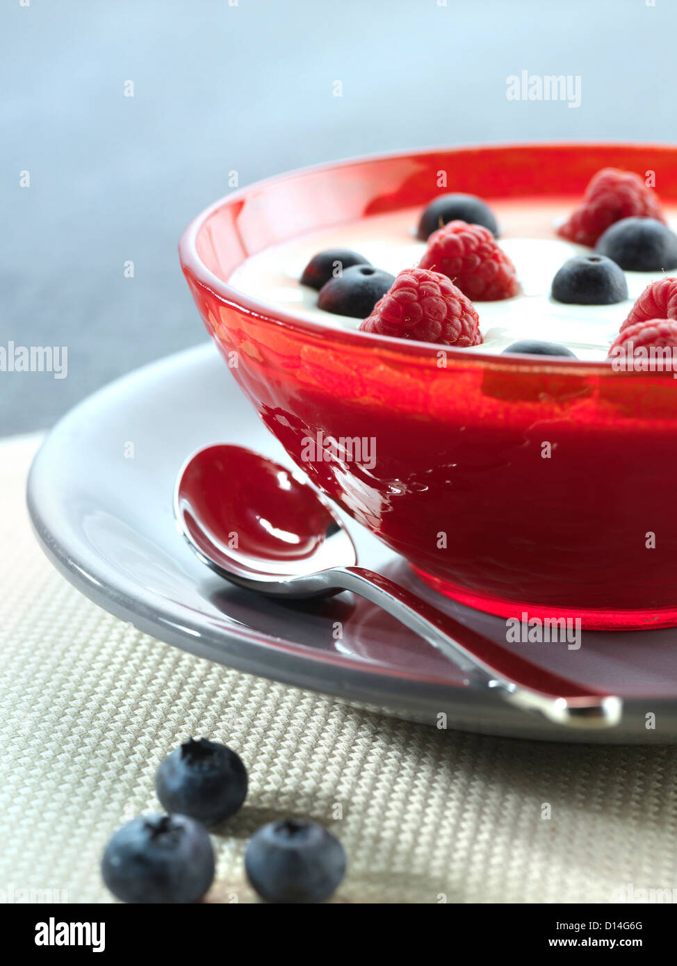 Yoghurt bowl raspberries blueberries Stock Photo