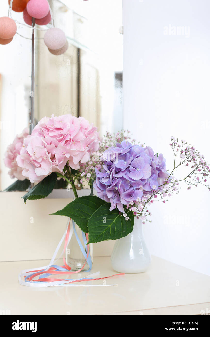 Colorful flowers in glass vase Stock Photo - Alamy