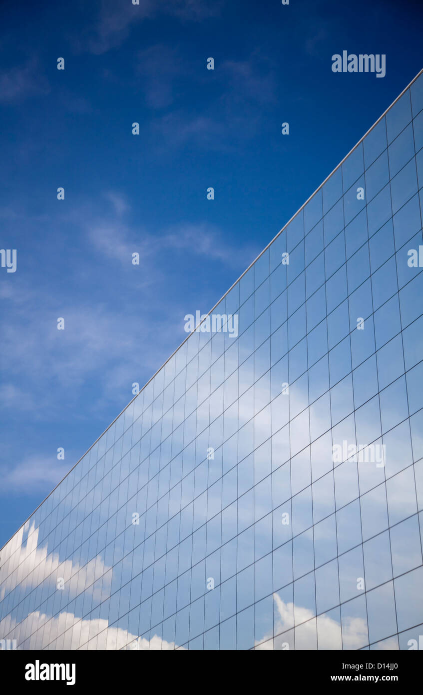 Office building and blue clear sky with cloudscape reflection Stock ...