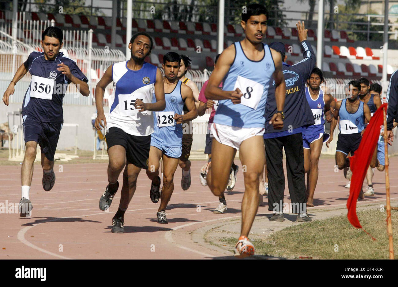 Students take part in a competition during 36th Inter- Varsity Athletics Championship 2012 organized by Sarhad University held at Qayyum Sports  Complex in Peshawar on Friday, December 07, 2012 Stock Photo