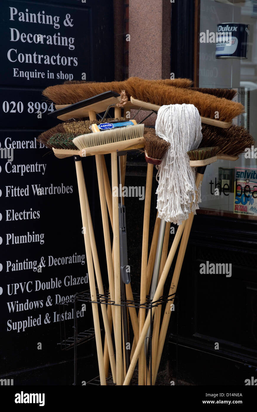 Brooms and mops for sale at a west London painters and decorators