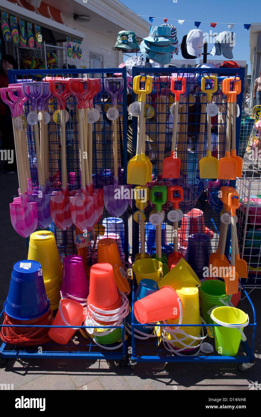 Buckets and spades for sale in a beach shop souvenir stall Weston Super