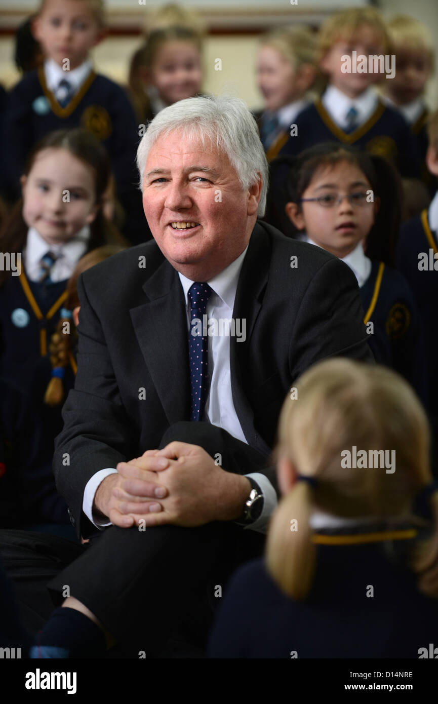 Headmaster James Devine talking to children in morning assembly at Our Lady & St. Werburgh's Catholic Primary School in Newcastl Stock Photo