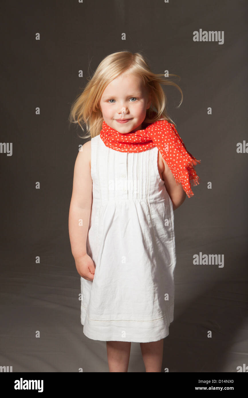 Girl smiling in studio Stock Photo - Alamy