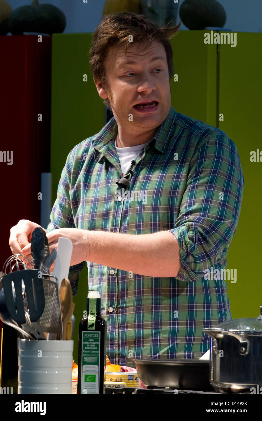 London, UK. 7th December 2012. Jamie Oliver conducts a cooking ...