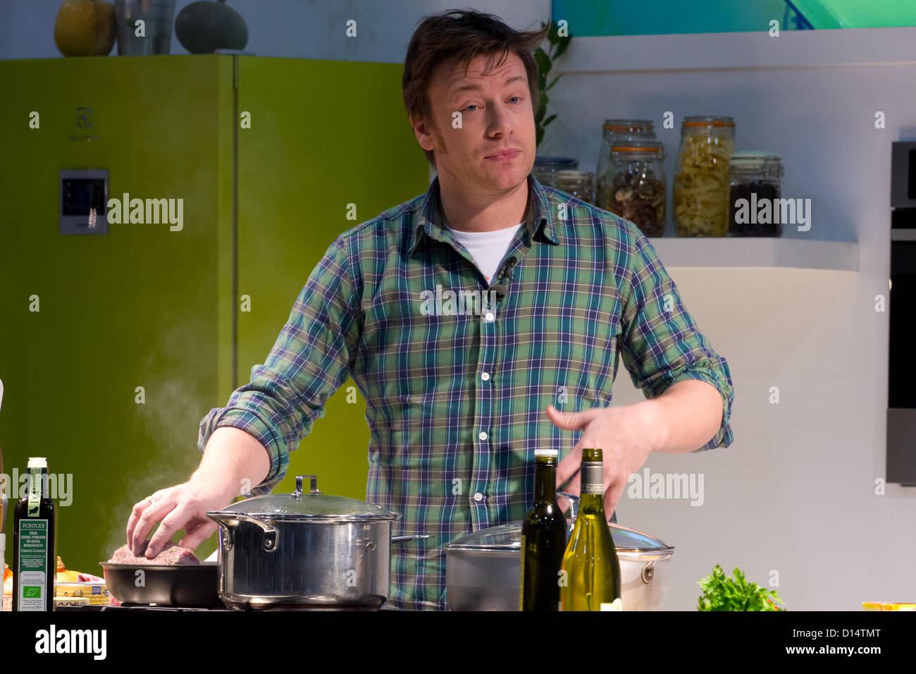 London, UK. 7th December 2012. Jamie Oliver conducts a cooking ...