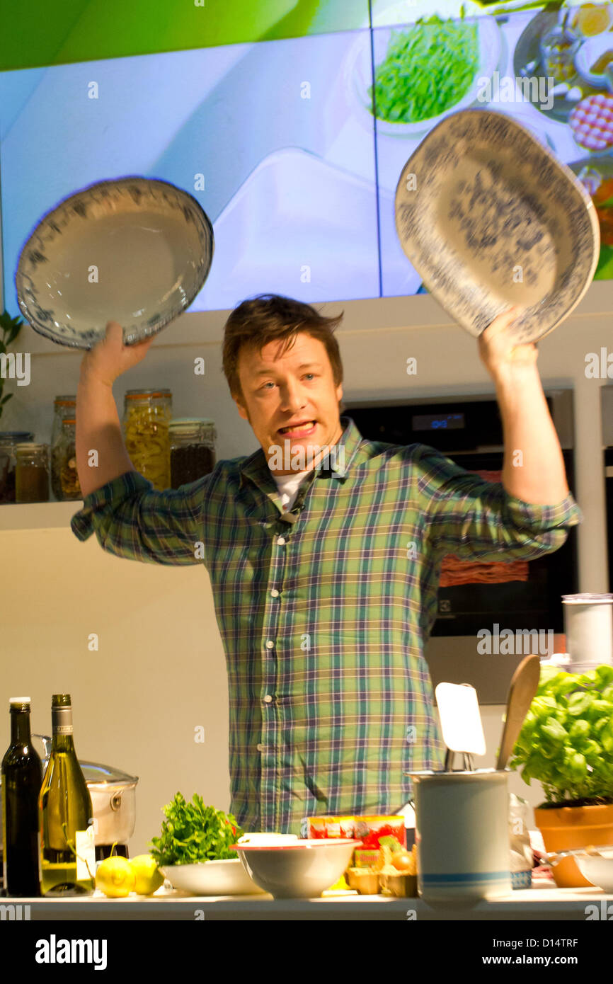 London, UK. 7th December 2012. Jamie Oliver conducts a cooking ...
