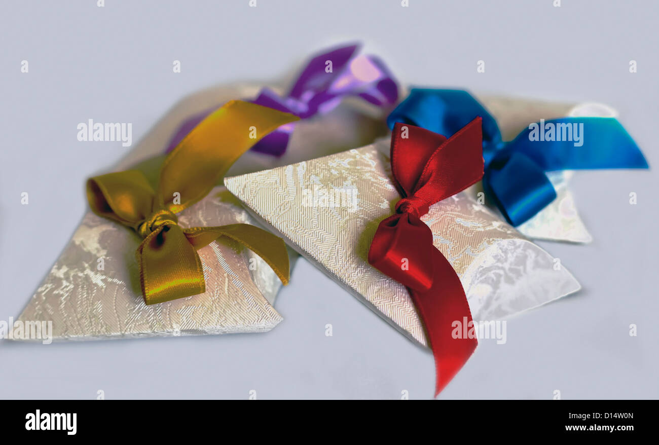 Paper boxes with colorful bows Stock Photo