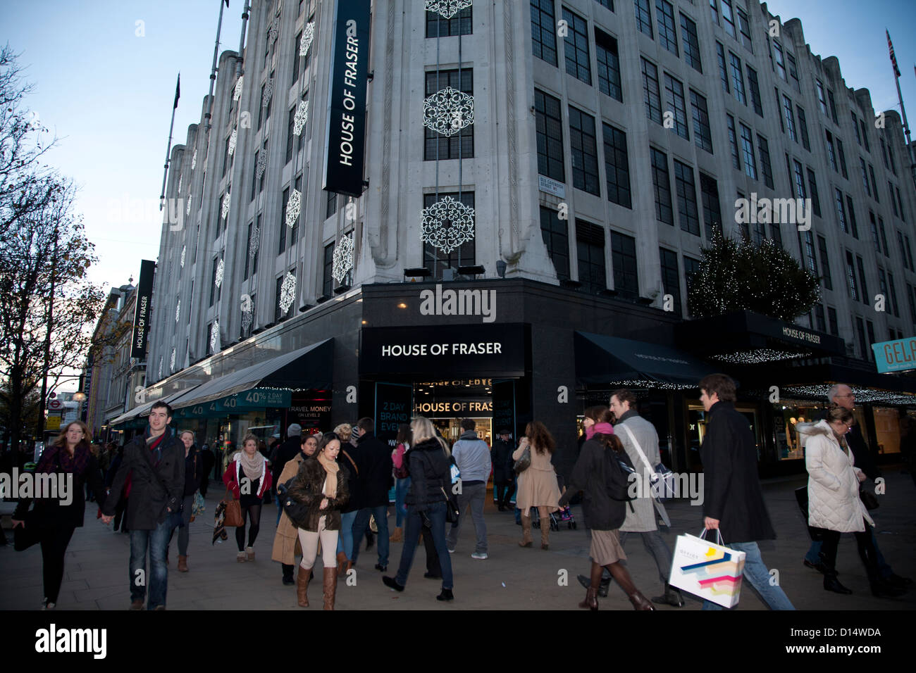 Christmas shopping, Entrance to John Lewis, Oxford Street, London, England, United Kingdom, Europe Stock Photo