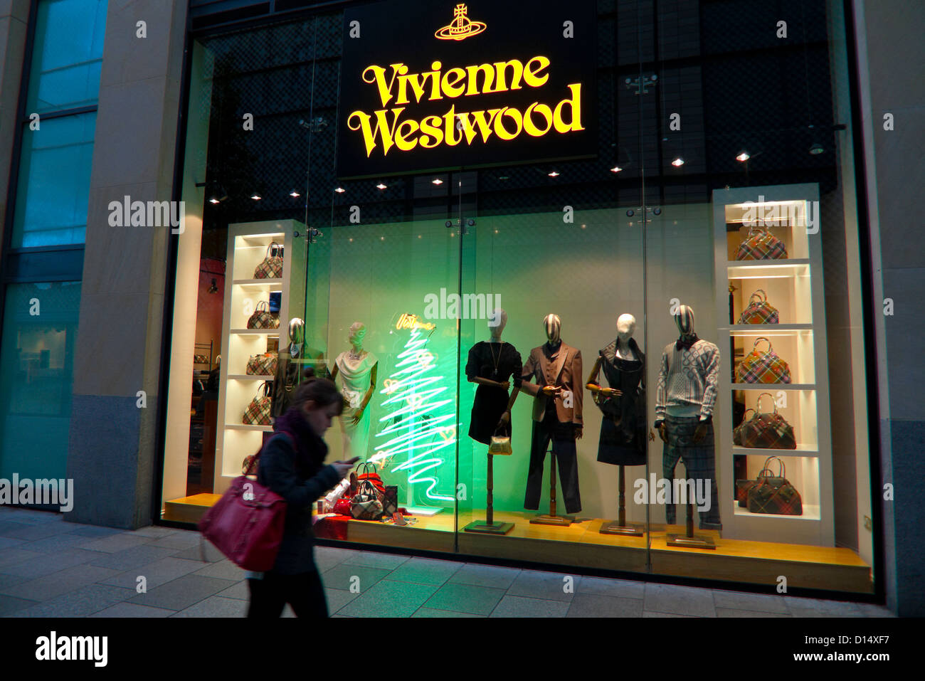 Exterior view of London fashion designer Vivienne Westwood retail shop  window of store at night during Christmas in Cardiff Wales UK KATHY DEWITT  Stock Photo - Alamy