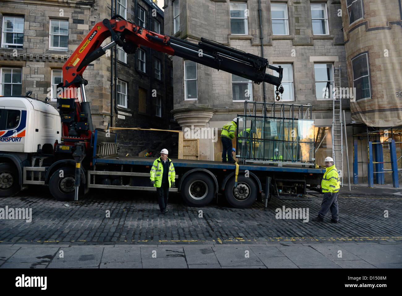 Unloading new windows for new hotel at Advocates Close, close to High Street, Edinburgh, Scotland Stock Photo