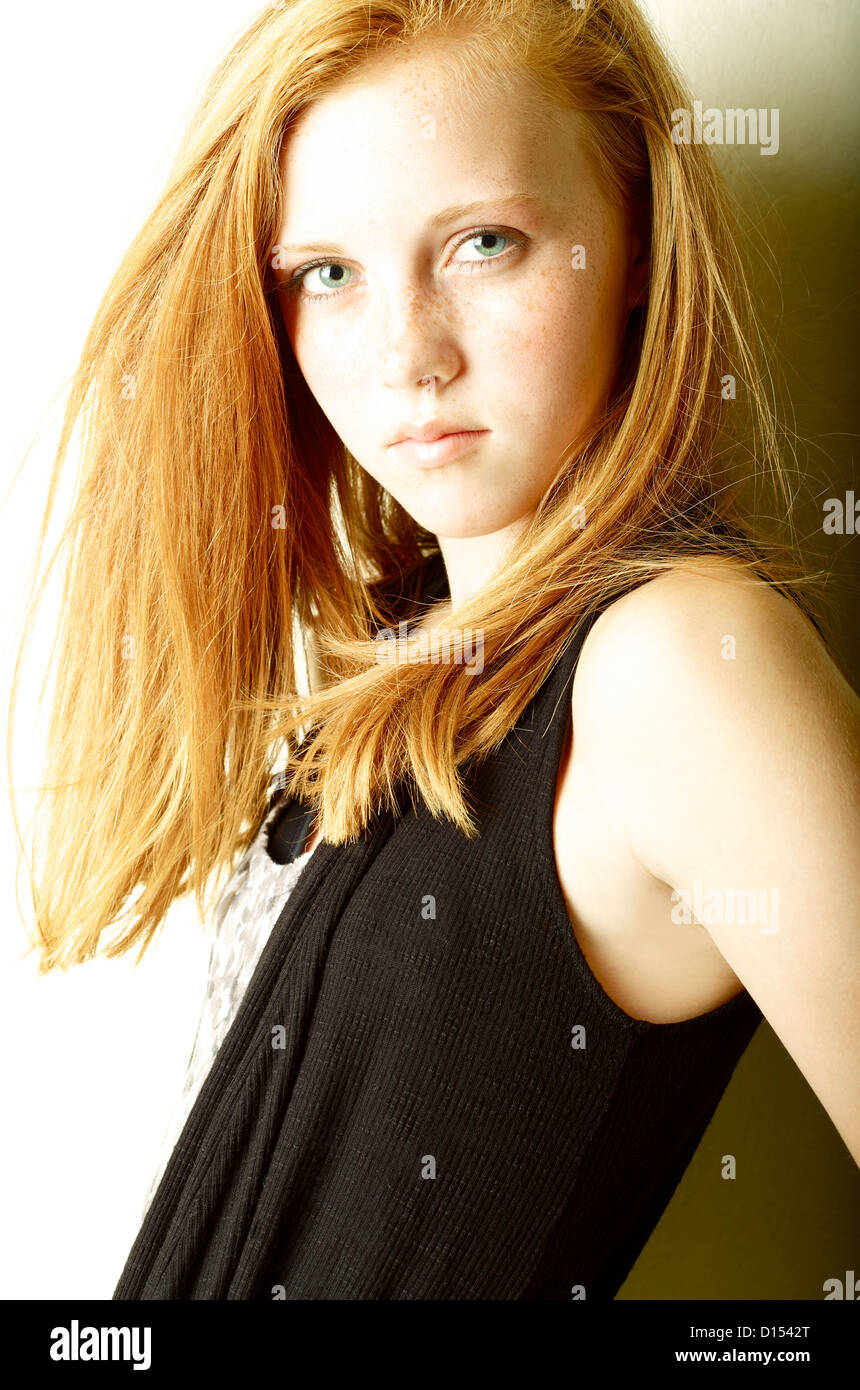 Young Woman With Freckles And Red Hair Poses For Camera Stock Photo - Alamy