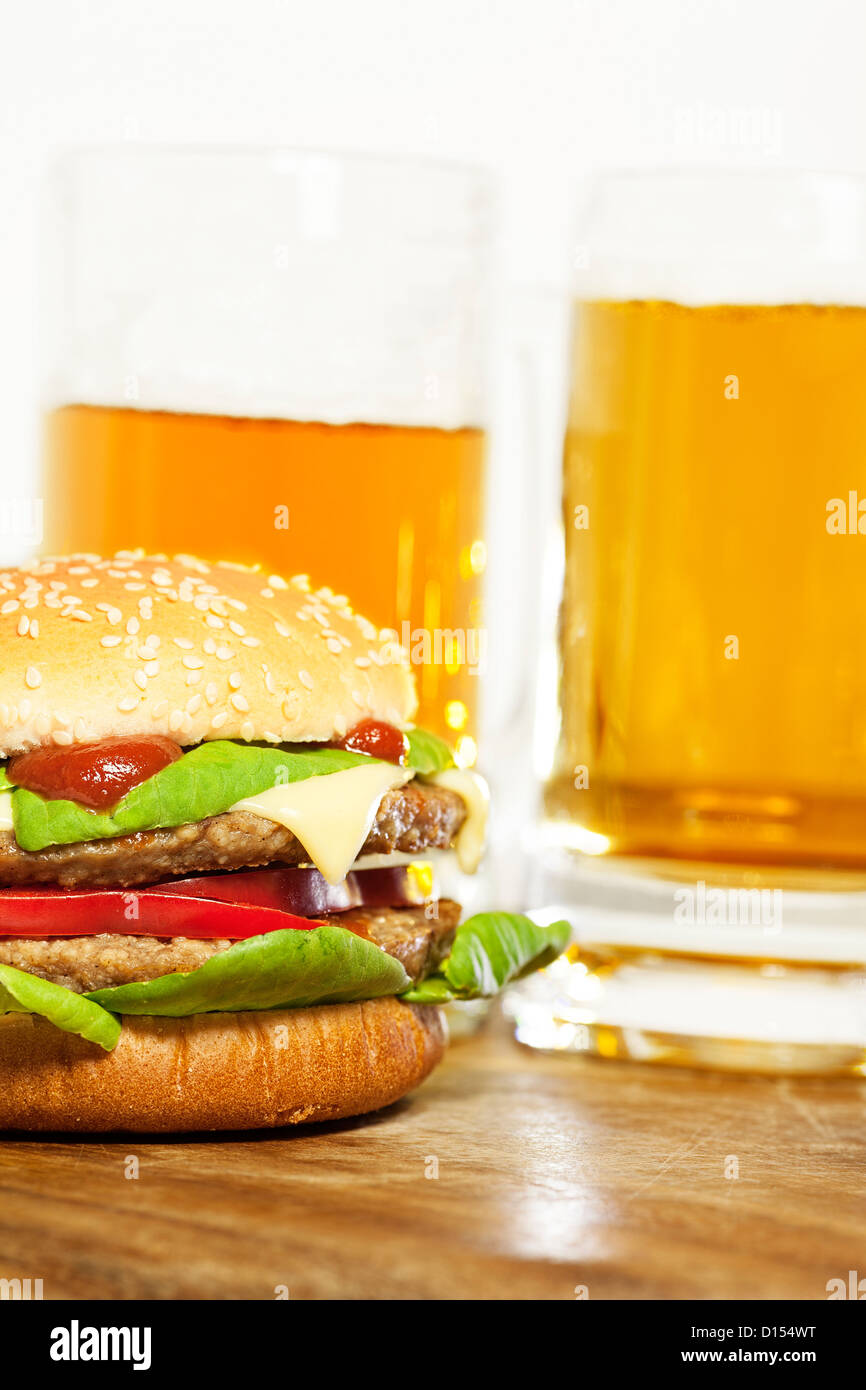 Delicious cheeseburger. Vertical shot. Stock Photo