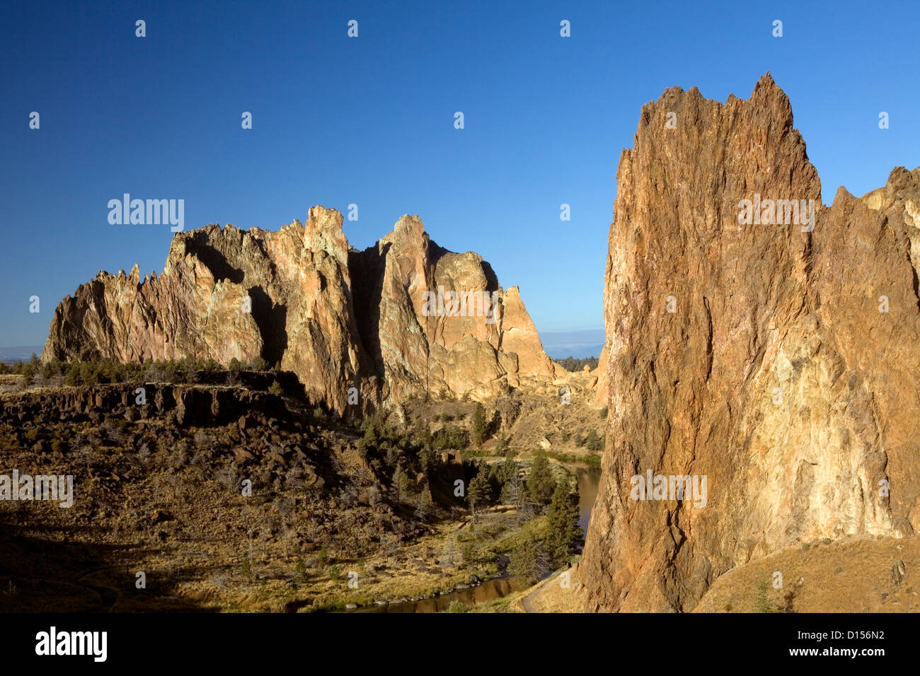 OR00477-00.....OREGON - Rocky spires walls along the Crooked River at Smith Rocks State Park, a popular rock climbing area. Stock Photo