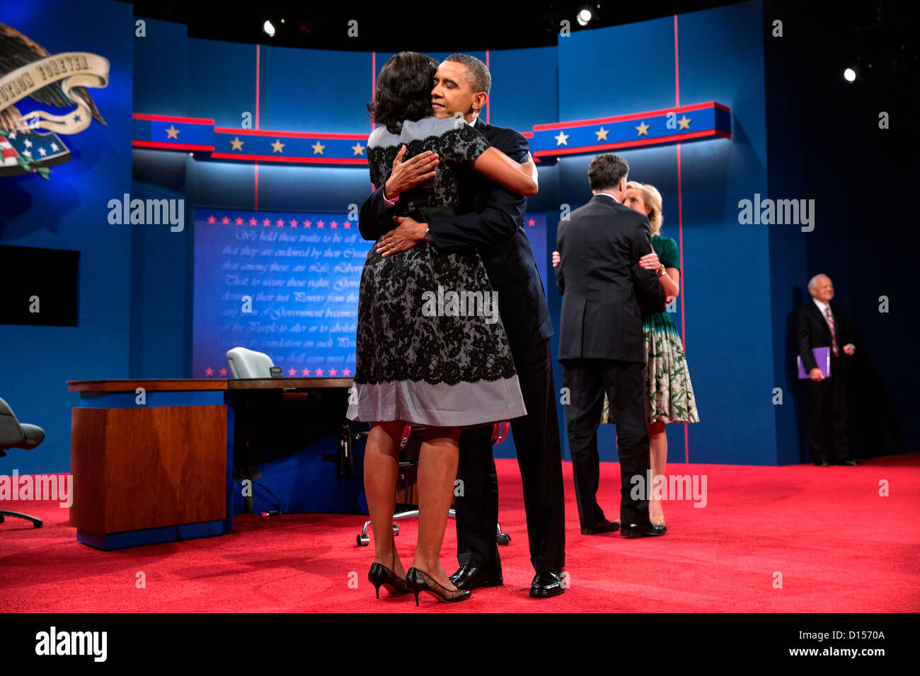 US President Barack Obama hugs First Lady Michelle Obama following the third presidential debate with Gov. Mitt Romney at Lynn University October 22, 2012 in Boca Raton, FL. Stock Photo