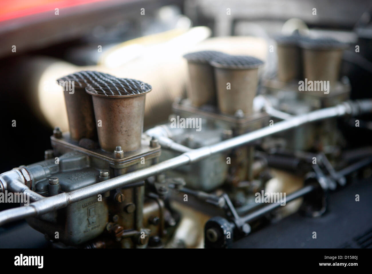The air intake trumpets of a classic V12 Ferrari engine Stock Photo Alamy