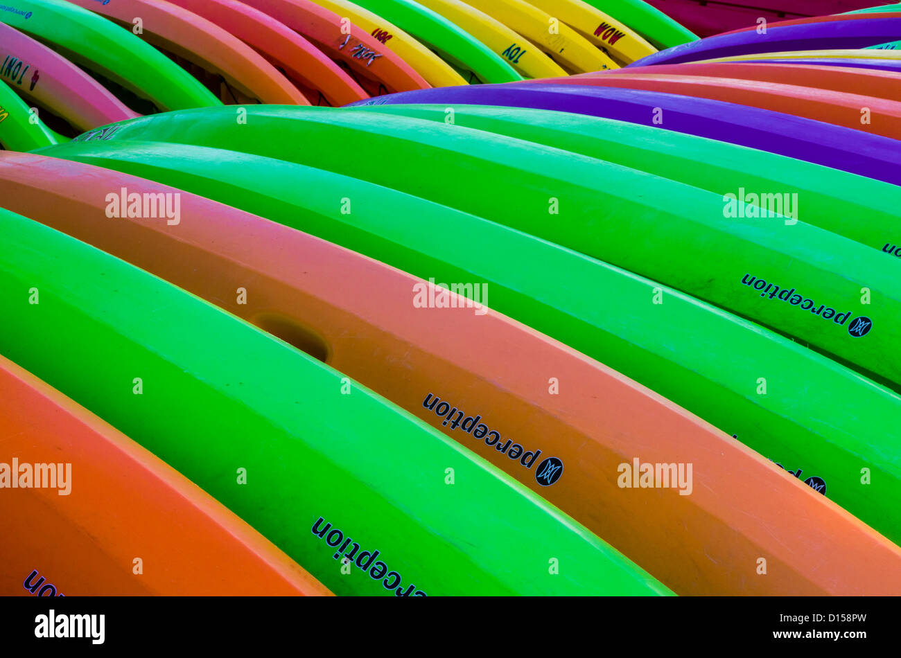 USA, Florida, Key Largo. Abstract of colorful kayaks and canoes overturned at John Pennekamp Coral Reef SP. Stock Photo
