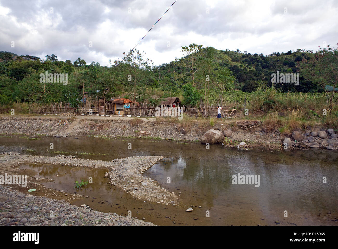 Philippine mountain village along the banking of the Subic River near Subic Bay, Luzon Island, Philippines. Stock Photo