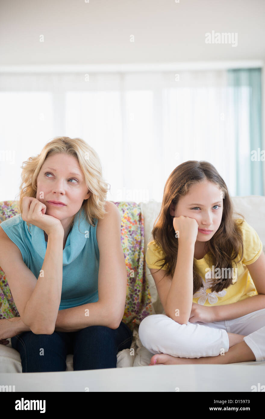 USA, New Jersey, Jersey City, Mother and daughter (8-9 years) looking upset Stock Photo