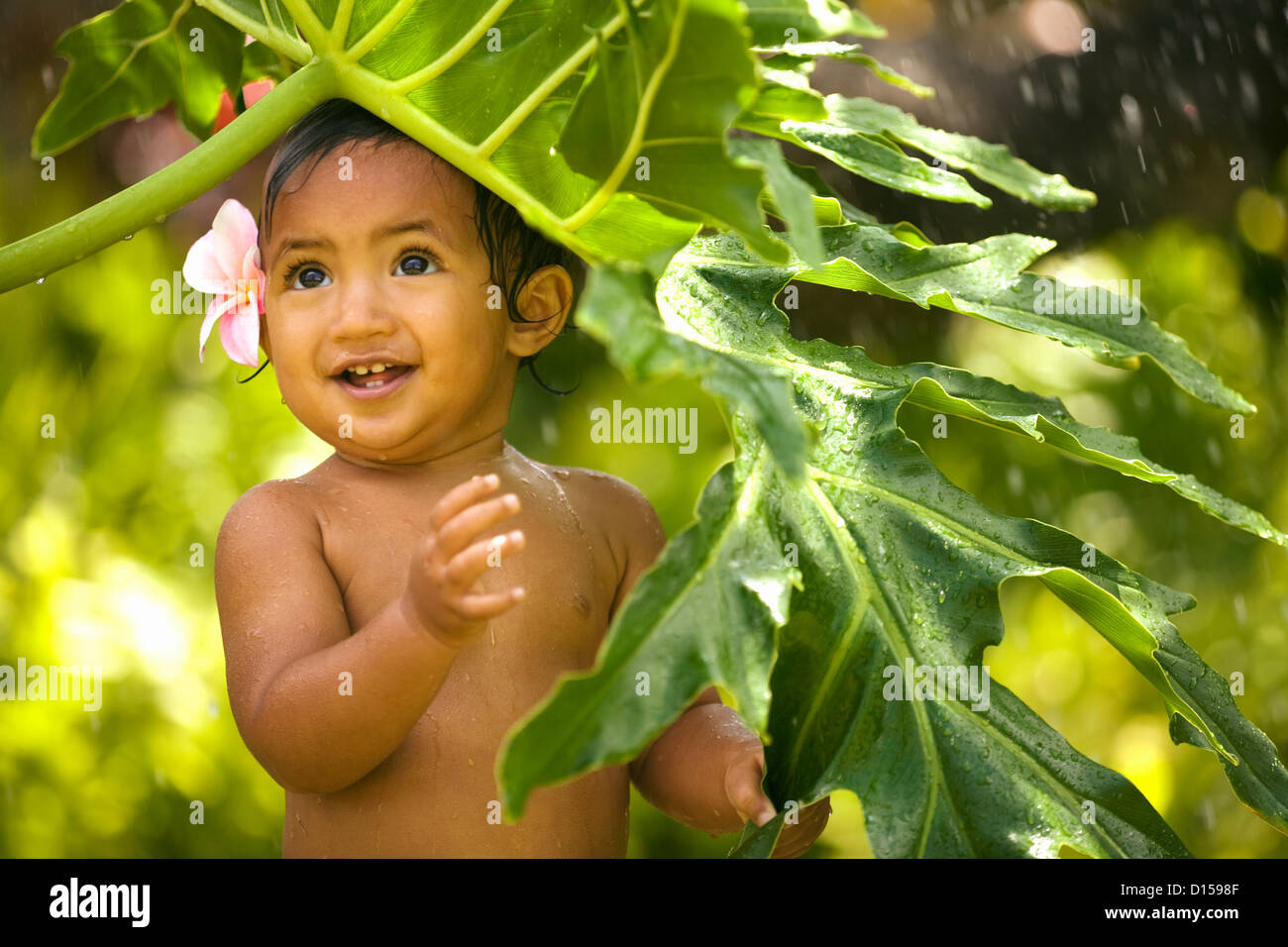 Hawaii, Oahu, Baby Girl Playing With Water Stock Photo Alamy