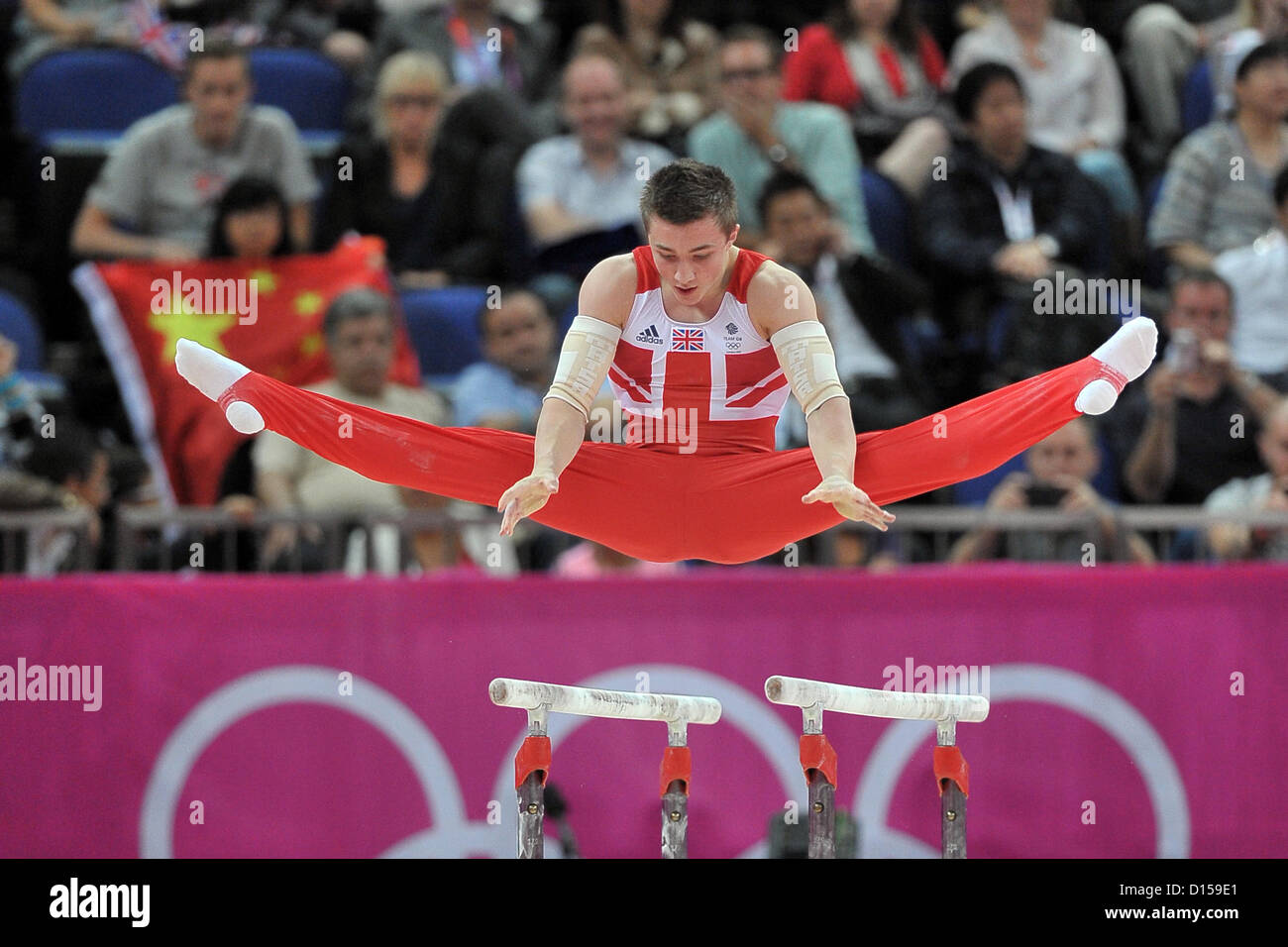 Sam Oldham (Great Britain) on the Parallel bars Mens Team Artistic Gymnastics Stock Photo