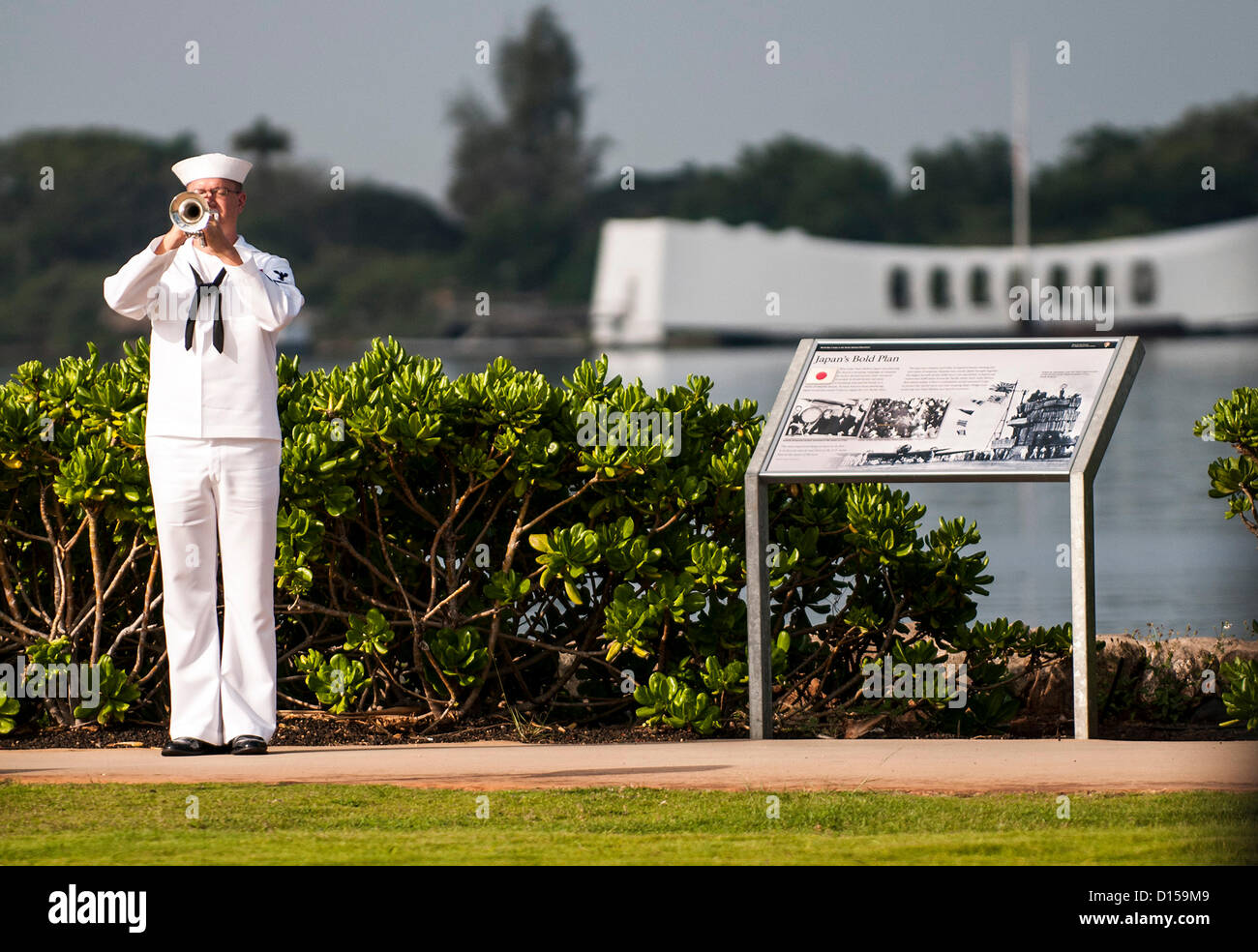 Peral Harbor, Hawaii, USA. 7th Dec, 2012. A Navy bugler plays Echo Taps at the 71st Anniversary Pearl Harbor Day Commemoration December 7, 2012 in Pearl Harbor, HI. The Navy base was attacked by Japanese forces on December 7, 1941. Stock Photo