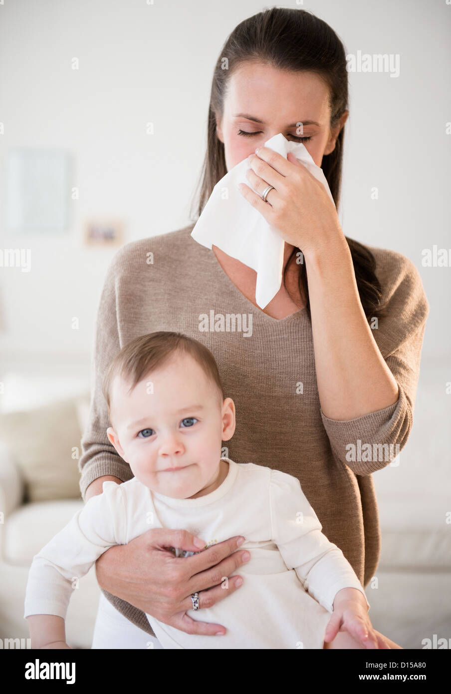 USA, New Jersey, Jersey City, Mother holding her daughter (611 months