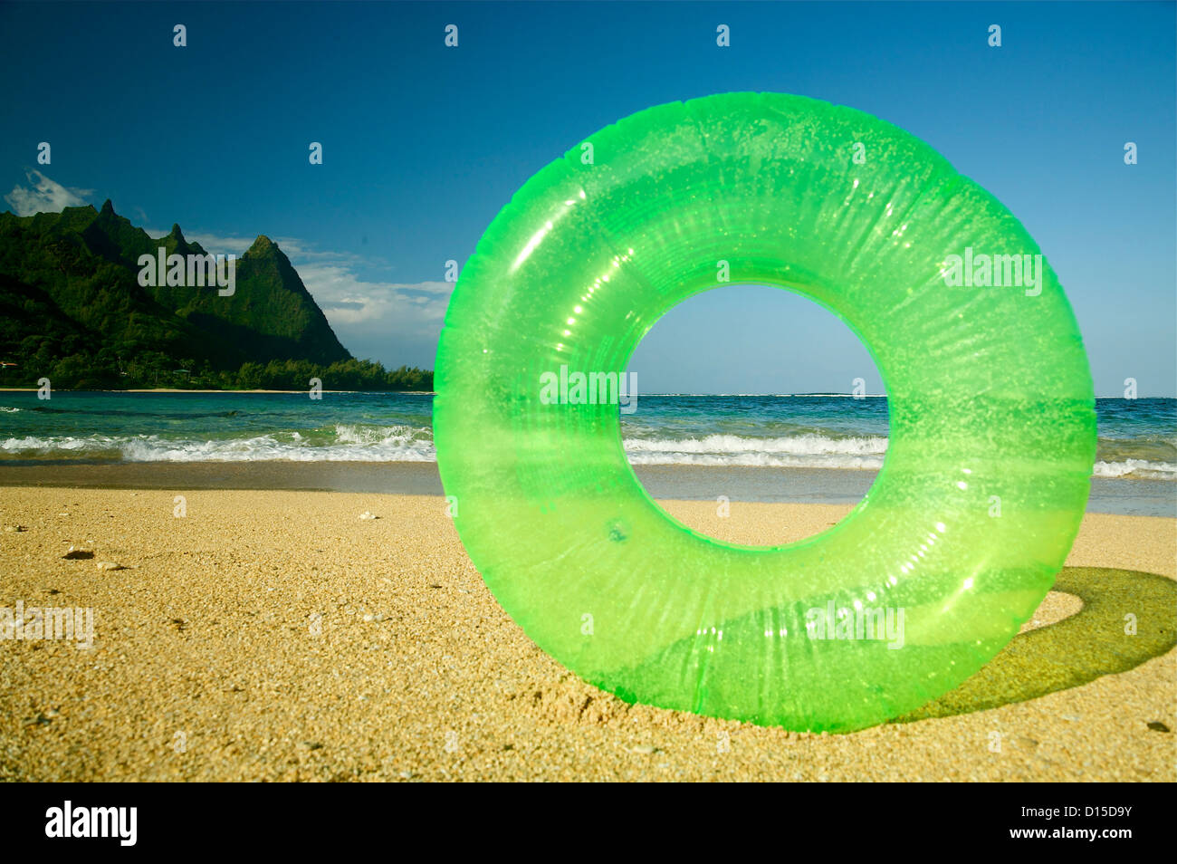 Hawaii, Kauai, Tunnels Beach, Green Innertube On The Beach Stock Photo