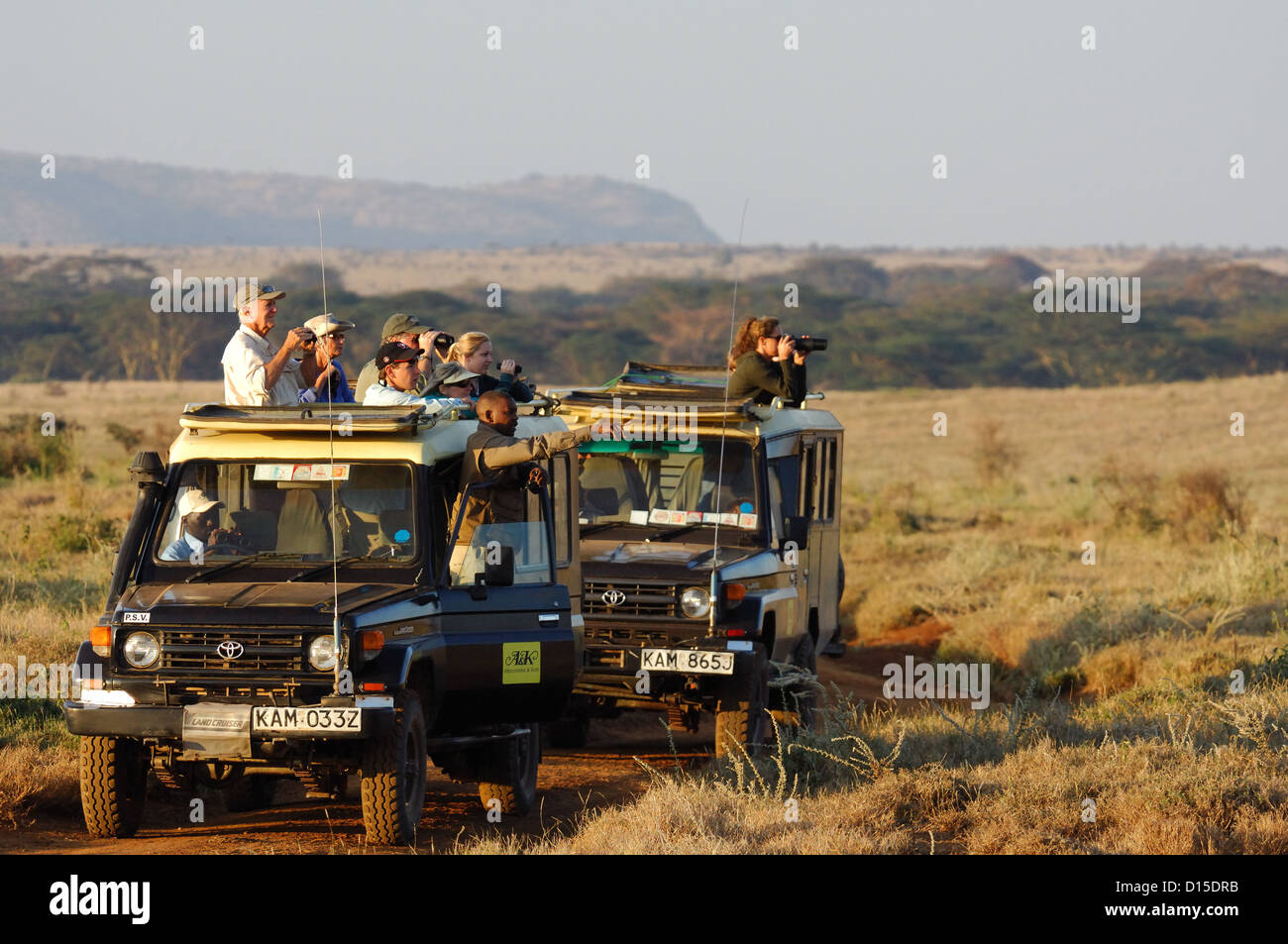Tourists on an African game viewing safari at Lewa Downs Kenya Africa Stock Photo