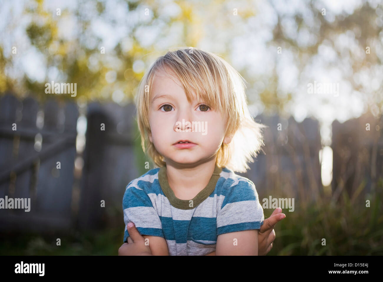 USA, Colorado, Toddler boy with arms crossed Stock Photo