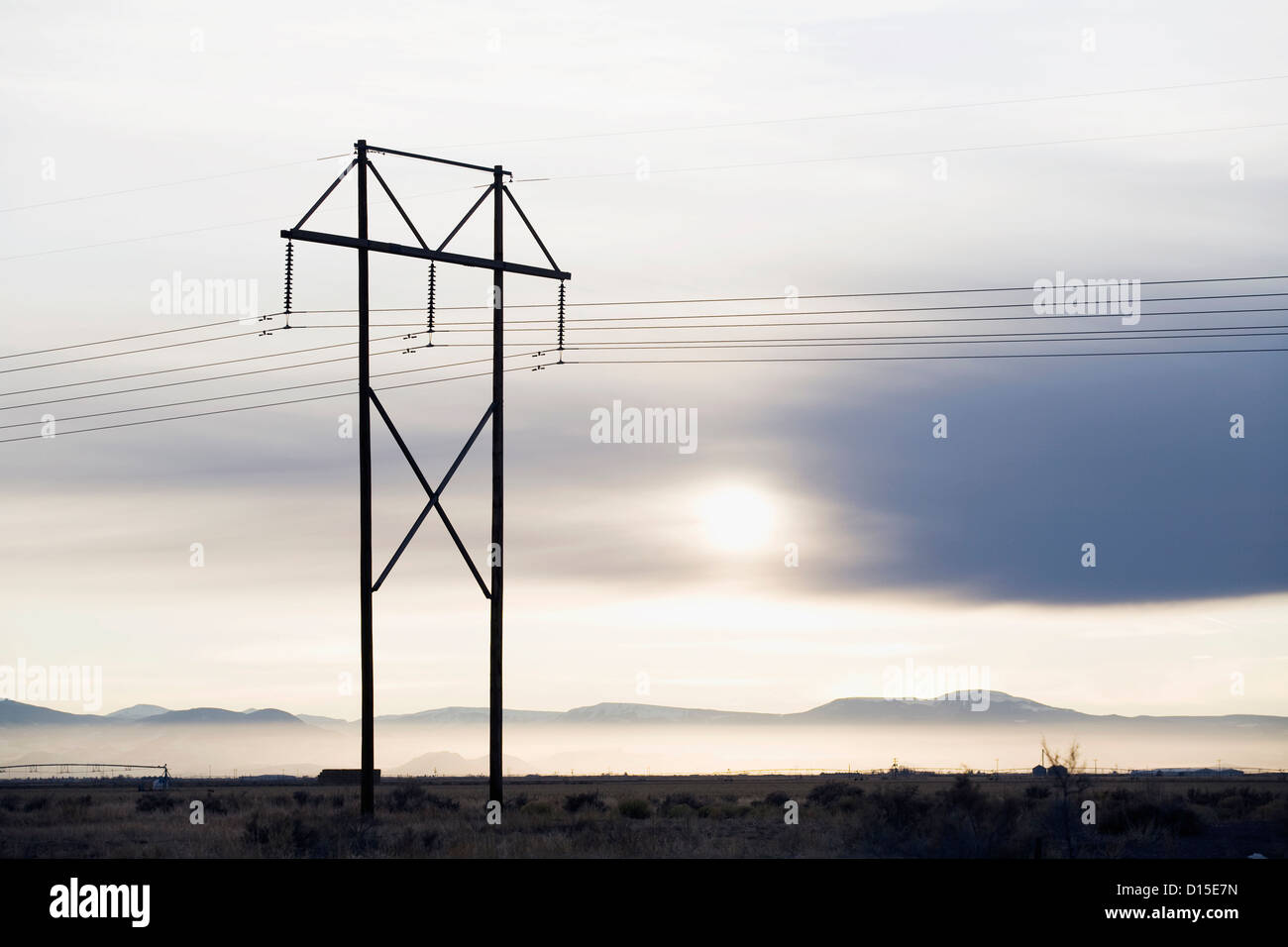 USA, Colorado, Power lines and tower at sunset Stock Photo Alamy