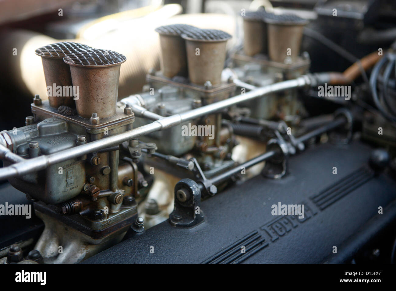 The air intake trumpets of a classic V12 Ferrari engine Stock Photo Alamy