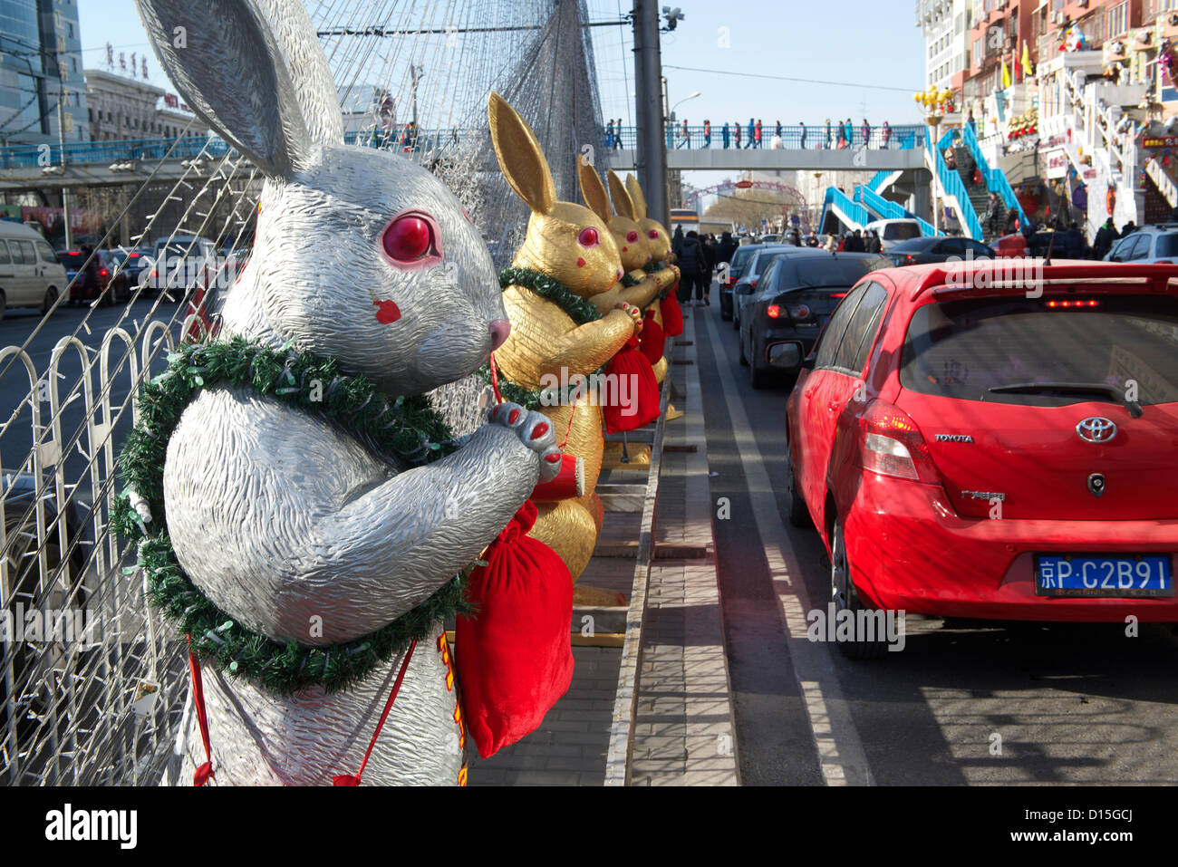 Statues of Tuye or The Moon Rabbit are decorated alongside a street ...