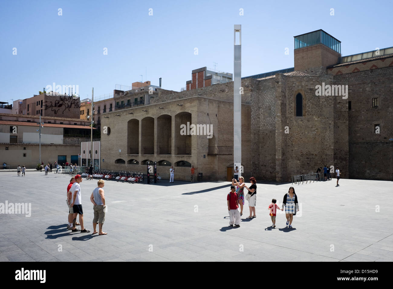 Barcelona, Spain: Tourists enjoying sightseeing in Plaça dels Angles in Barcelona Downtown in a brilliant sunny day Stock Photo